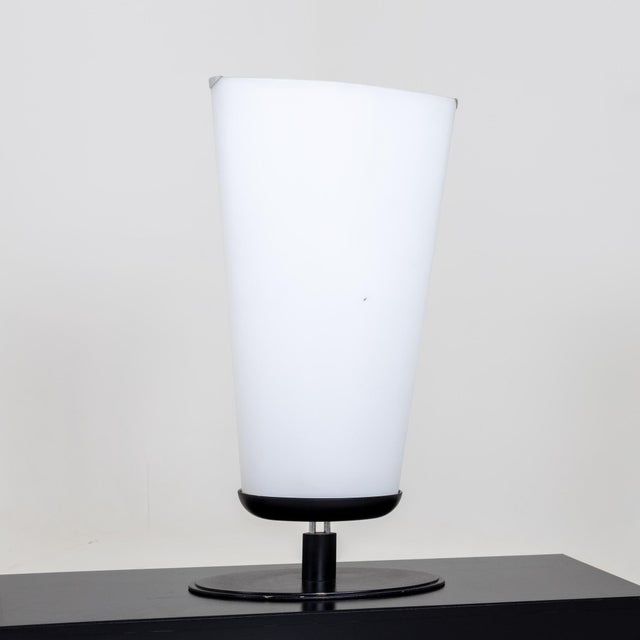 A large oversized Lucos Modernist table lamp. Frosted glass with a painted metal base.