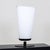 A large oversized Lucos Modernist table lamp. Frosted glass with a painted metal base.