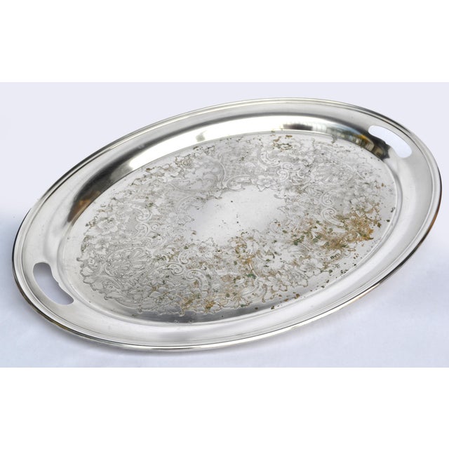 Gorham silver plate butler platter is a decorative and functional serving tray made with silver plating, often featuring...