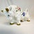 This is a stunning ceramic Bull figurine. It’s from Italy and features a muscular white bull with old gold tipped horns...