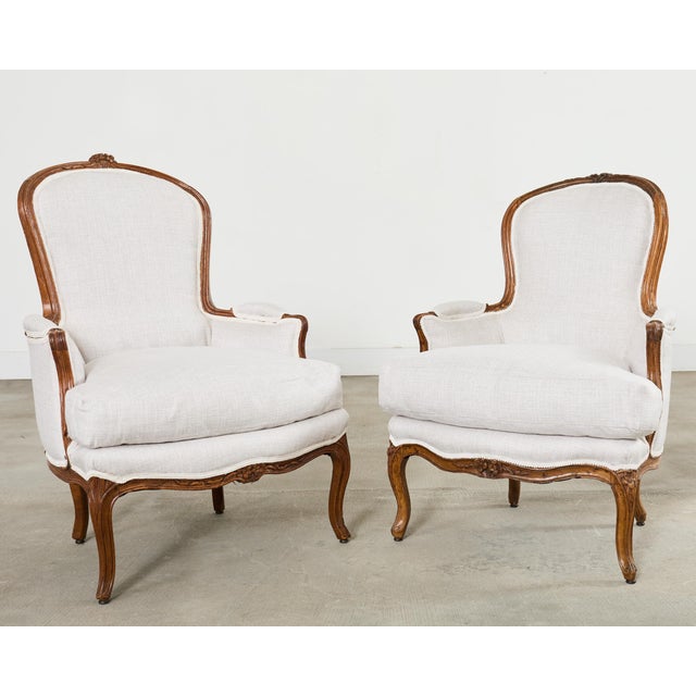 French Pair of French Louis XV Style Walnut Bergeres With Linen For Sale - Image 3 of 18