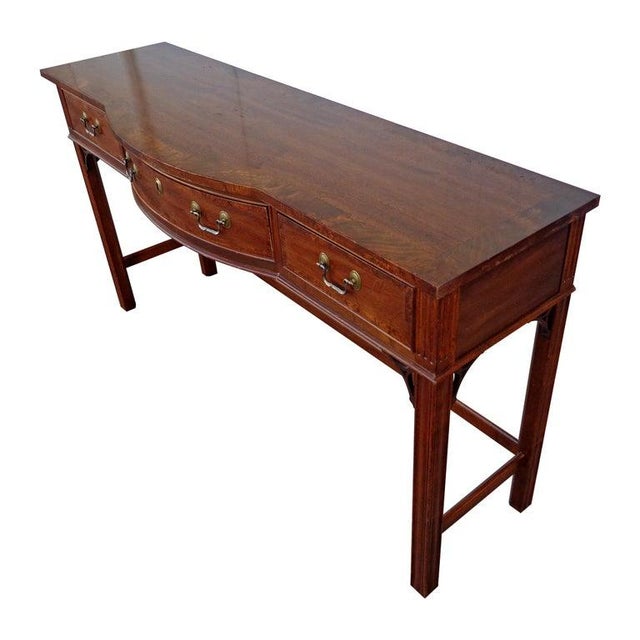 Sherrill Occasional console table with Birdseye maple bordering the inlay on the top and 3 drawers, on straight legs.