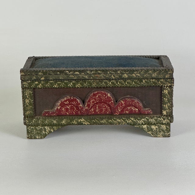 A most exceptional Tramp Art/Folk Art sewing box, circa early 20th Century. It's hand constructed of carved wood and...