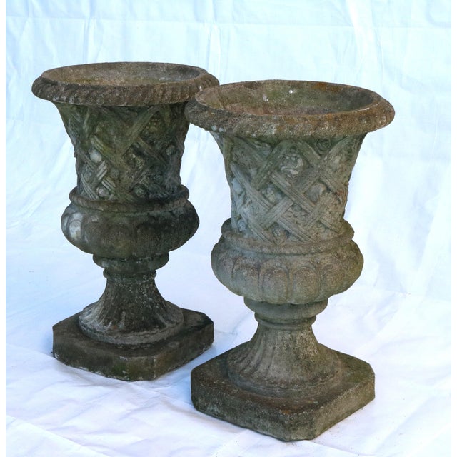Vintage Large Concrete Garden Urns With Floral Rosetta Relief and Tudor Weave Design- A Pair For Sale - Image 4 of 13