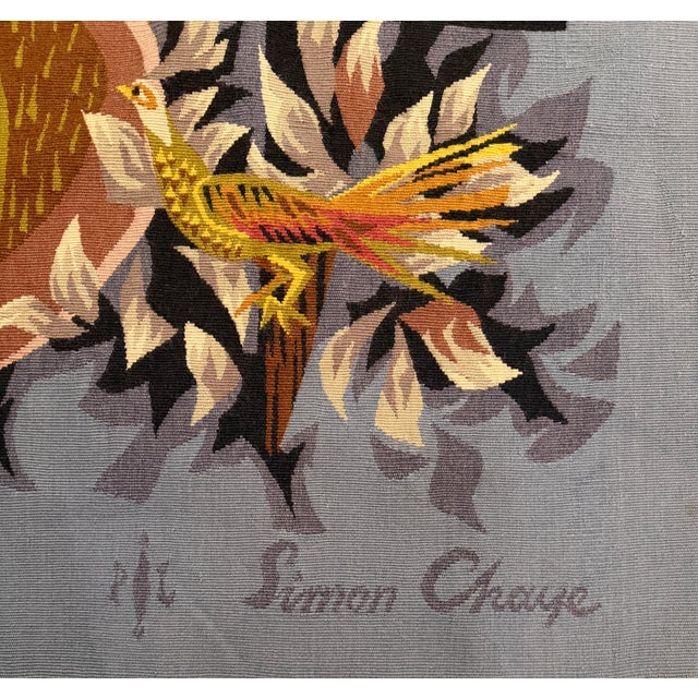 A vibrant French Aubusson tapestry titled Concert Champêtre (“Pastoral Concert”), designed by Simon Chaye and handwoven by...