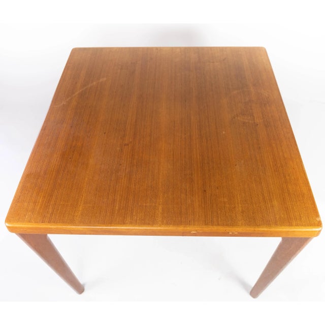 Dining table with extensions in teak designed by Henning Kjærnulf from the 1960s. The table is in great vintage condition....