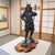 A substantial late 20th-century Japanese samurai warrior sculpture with exceptional architectural presence and richly...