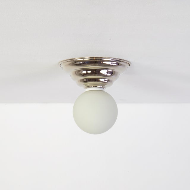 Rippled metal meets matte glass. The Hive Flush Mount plays with texture, light, and just a touch of magic. Materials...