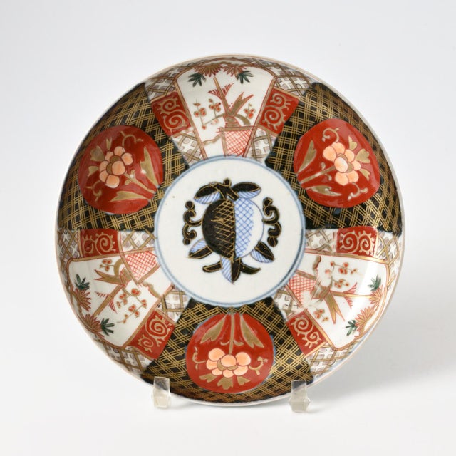 Set of four antique, circa 1900, Japanese Imari porcelain plates.