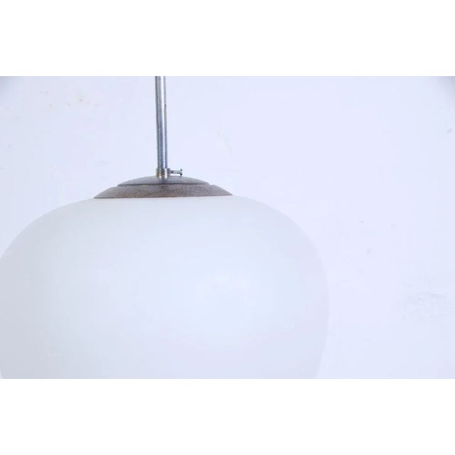 Beautiful vintage chandelier, original production of the 1950s. Rigid metal auction in support of the light point and the...