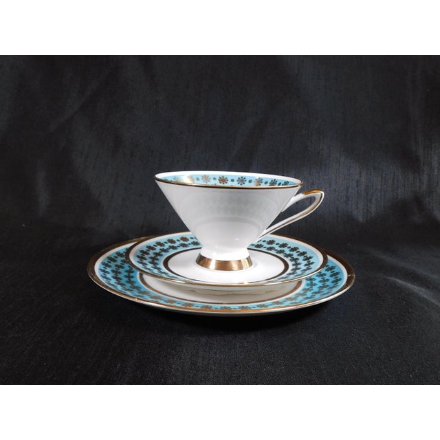 This is a Winterling three piece luncheon set which includes a footed teacup, saucer and luncheon plate in an unknown...