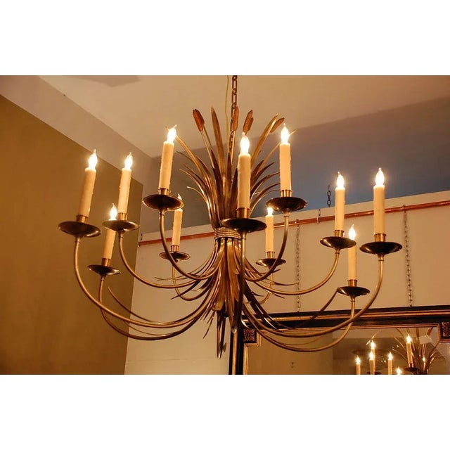 Large French 1960s chandelier by Maison Charles, Paris. Referenced model: Modèle "aux joncs." From a Parisian apartment....