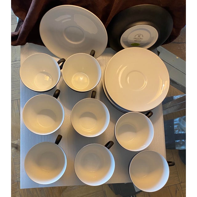 1950-60's black and white porcelain cup and saucer sets designed by Raymond Loewy for Rosenthal. Pattern is Continental...