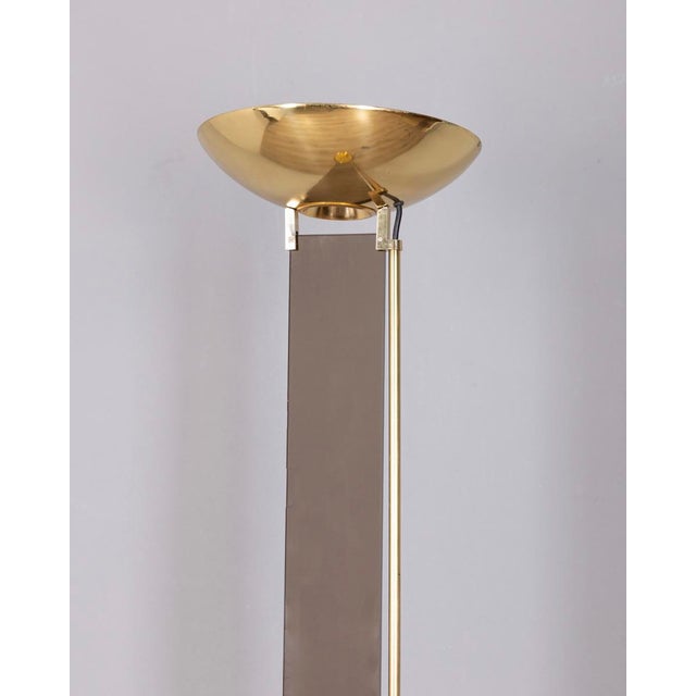 Floor lamp with gilded brass structure and smoked glass, designed by Relux Milano, 1980s This piece has an attribution...