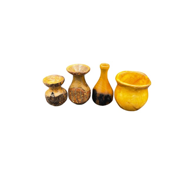 Vintage set of 4 hand turned wood vases. Small Dark - 3” W x 3” D 3 .75“ H Large Dark 3” W x 3” D d 5.5” H Long Neck 3.25...