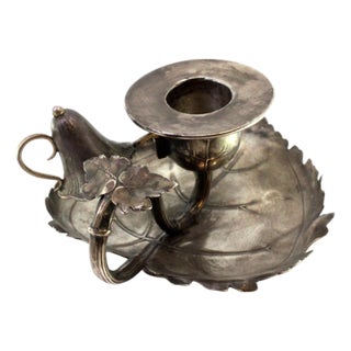 Silver Paddle with Reliefs and Leaf-Shaped Cut Out Base For Sale