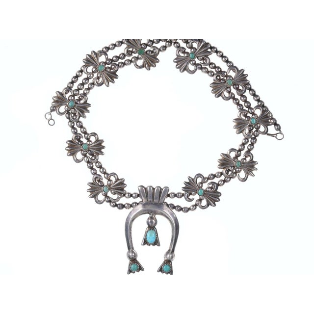 Vintage Navajo Silver Tufa Cast Squash blossom necklace with turquoise. 28"<br>long, 3.25" tall x 1 7/8" wide naja,...