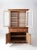This is an American wooden cupboard circa late 19th century. The wood hutch cabinet features a glass door shelved top. The...