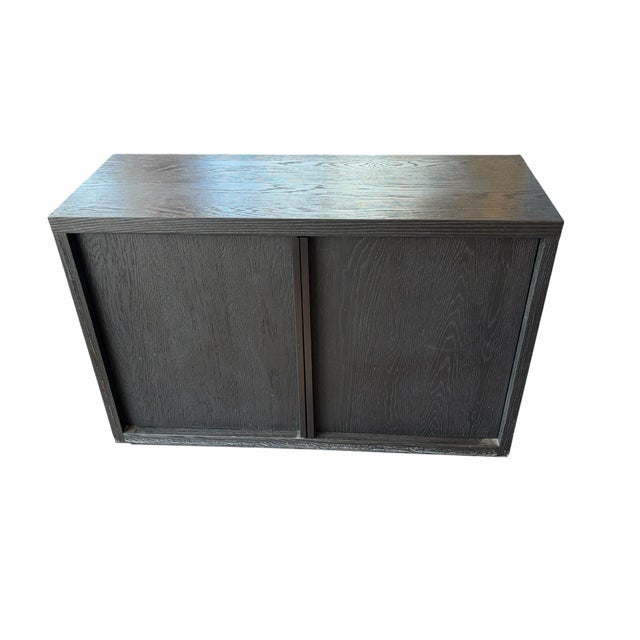 Designed by Van Thiel for Restoration Hardware, this authentic Bézier Sideboard brings mid-century French minimalism to...