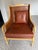 Elegant set of four French-style Bergère wingback chairs featuring woven cane backs and sides, a lightly pickled wood...