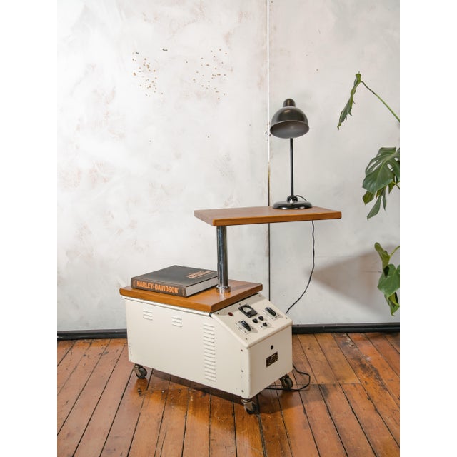 A vintage famed surgical lamp cart from poland, reworked into a two-tier side table with handcrafted dark oak tops. famed...