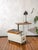 A vintage famed surgical lamp cart from poland, reworked into a two-tier side table with handcrafted dark oak tops. famed...