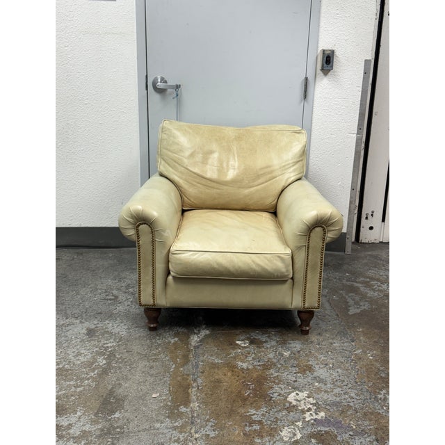 Design Plus Gallery presents a Benchmade Tipped Ivory Leather Arm Chair. Kiln dried wood frame is layered with foam,...