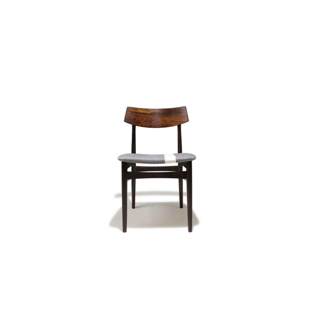 Handcrafted from Brazilian rosewood, these high-quality dining chairs showcase dynamic, dark-figured grain and fine...