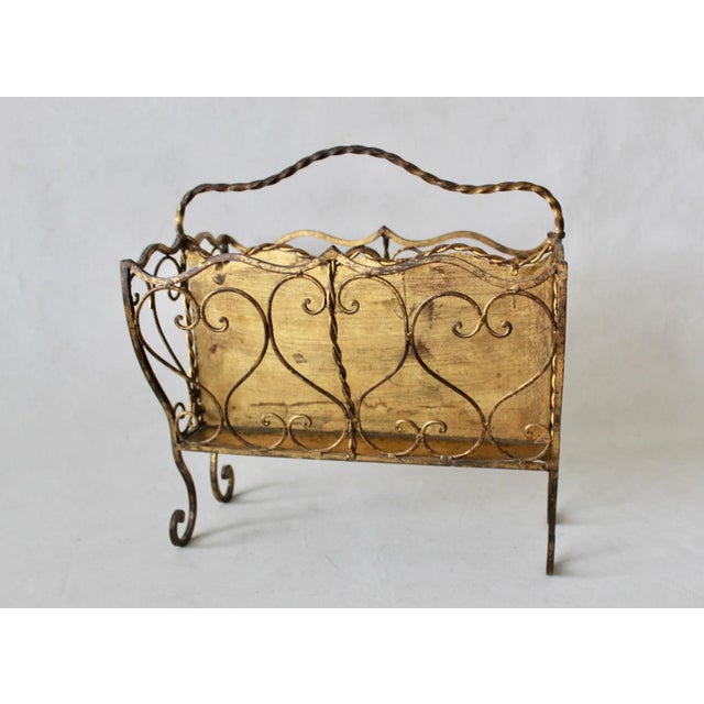 Vintage Italian Florentine gold gilt metal magazine rack or stand. Beautiful curled feet, heart shaped designs very heavy...