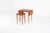 This is a beautiful vintage Scandinavian nesting table set made of warm-toned wood. The design is practical and stylish,...