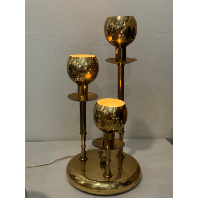3-Tiered Mid-Century Modern Brass Table Lamp. This is a fantastic, triple orbed light in the style of Paavo Tynell. It has...