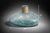 Mobile-Ready Blurb Large aqua recycled glass demijohn-style decorative vessel with a wide sculptural form and natural...