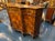 The Early 20th Century Italian Burl Walnut Shaped Buffet is a luxurious and stylish piece of furniture that exudes...