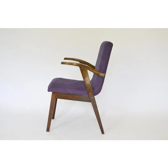This 300-123 Puchały armchair is reupholstered in purple velvet. The wooden part is in its original state and has signs of...