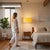 Built with satin nickel and featuring a mustard linen shade, the Stretch Pendant is a modern lighting solution by the NOVA...