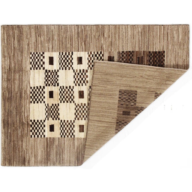 Gorgeous Persian Gabbeh rug. Hand-knotted. Hand-spun fine lamb's wool. The lovely piece of your home. This rug has a...