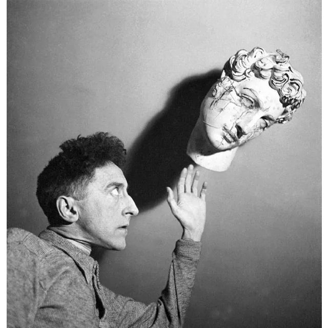 "Jean Cocteau" by Keystone-France Portrait in the 1920s or 1930s of the writer Jean Cocteau in a decor that relates to his...