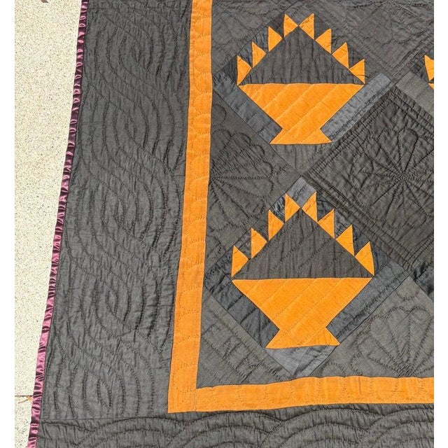 20Thc Amish baskets quilt in a polished cotton back round with wool pumpkin colored baskets. This very rare & most unusual...