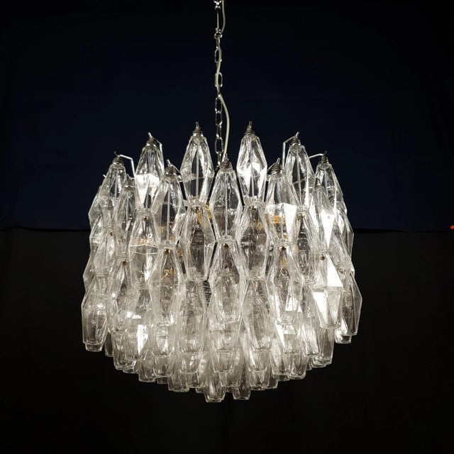 Vintage murano polyhedron chandelier. Venini style, 1960s. Maestrale polyhedron chandelier, with diameter 50 cm and height...