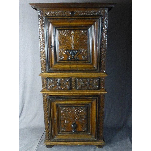 Exceptional standing man in carved walnut, Grenoble work of the XVIIIth century. Piece of furniture entirely in its...
