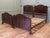 These are a very well matched pair, they are in an Odeon style, the head boards have a waved top matching the foot board...