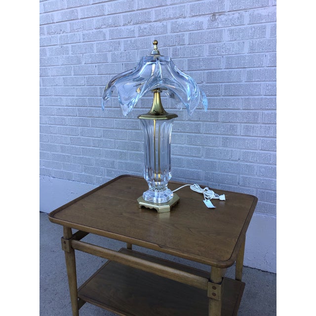 Elegant Art Deco table lamp by Cofrac Art Verrier, France, circa 1970s. This sculptural lamp features a dramatic clear...