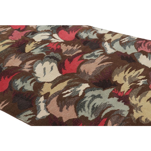 Hand-knotted in wool circa 1960-1970, this 5x9 vintage rug is an exciting new piece in Rug & Kilim’s Mid-Century Pasha...