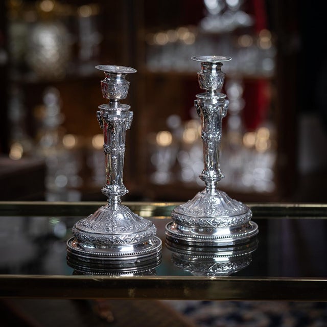 Antique 19th Century German (Hanau) pair of candlesticks. Designed by combining the Rococo style extravagance with neo...