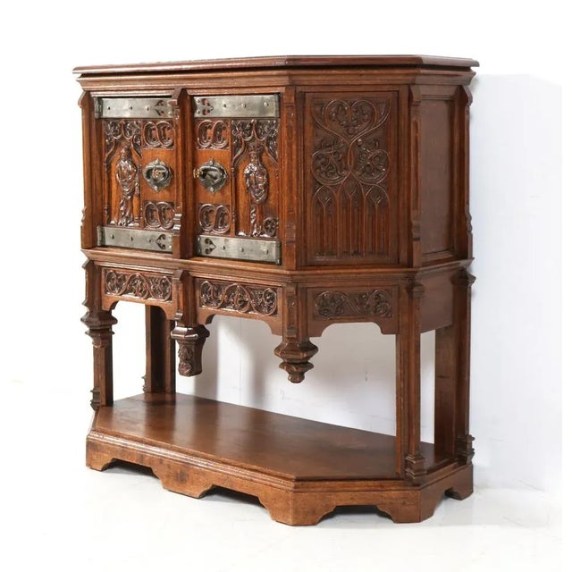 Stunning and rare Gothic Revival credenza. Striking Dutch design from the 1930s. Solid oak with original hand-carved...