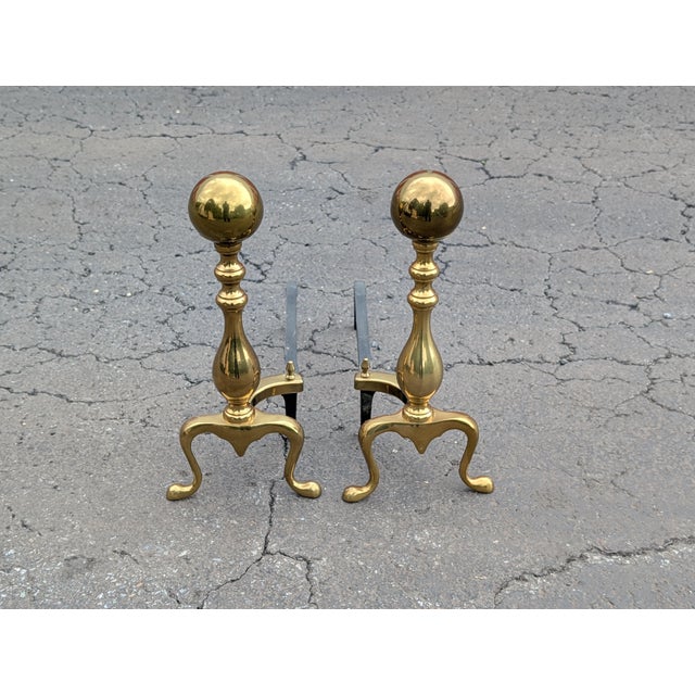 Commanding attention with classic Victorian elegance, these vintage brass fireplace andirons feature bold, polished...