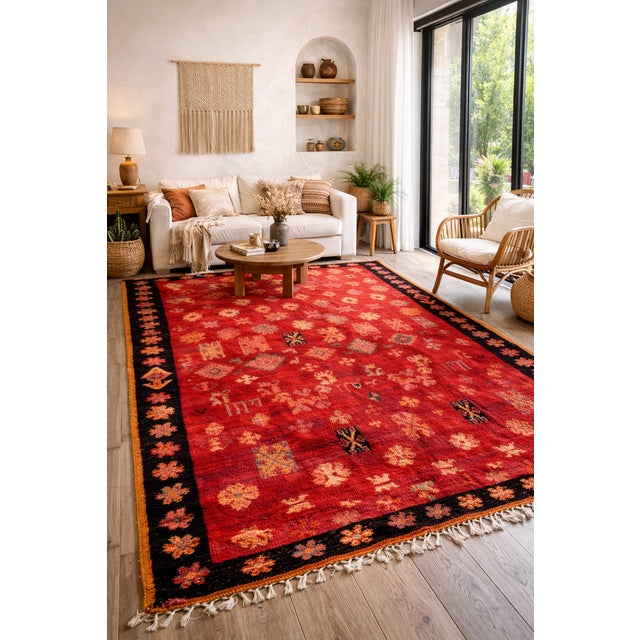 This authentic vintage Moroccan Boujad rug is a striking example of traditional Berber craftsmanship from the Haouz region...