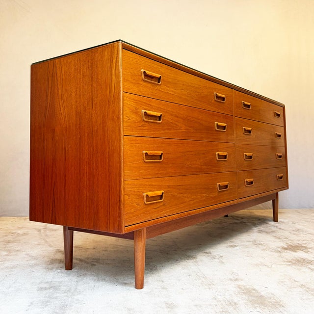 Eight generously sized drawers, arranged in two banks of four, make this a genuinely useful piece — plenty of room for...