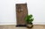 From the Bandiagara region of Mali, this two-plank granary door retains its original hand-carved wood lock, worked in a...
