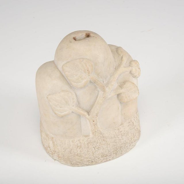 An antique crucifix base carved from light-colored stone, dating from the late 19th to early 20th century. The piece...